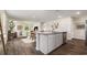 Bright, open concept kitchen with a large island and stainless steel appliances at 3579 Ashridge Way, Conway, SC 29526