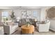 Cozy living room featuring a large sectional sofa, two chairs, and stylish decor at 3579 Ashridge Way, Conway, SC 29526
