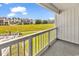 Enjoy the outdoors from the balcony overlooking the lawn, providing a tranquil setting at 3700 Golf Colony Lane # 25G, Little River, SC 29566