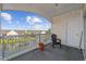 Outdoor balcony overlooking the complex's green space and pond at 3983 Forsythia Ct. # 301, Myrtle Beach, SC 29588