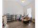 Bedroom featuring hardwood floors, ample natural light, and storage solutions for organized living at 3983 Forsythia Ct. # 301, Myrtle Beach, SC 29588