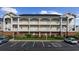 A well-maintained three-story condo with brick base, charming balconies, and accessible parking in a well-landscaped community at 3983 Forsythia Ct. # 301, Myrtle Beach, SC 29588
