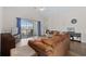 Comfortable living room offers hardwood floors, access to a screened porch, and features a vaulted ceiling at 3983 Forsythia Ct. # 301, Myrtle Beach, SC 29588