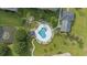Overhead shot of resort pool, pristine landscaping, and plentiful lounge chairs at 3983 Forsythia Ct. # 301, Myrtle Beach, SC 29588