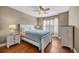 Cozy bedroom with hardwood floors, natural light, and coastal-themed decor at 4232 Pointer Ct., Myrtle Beach, SC 29579