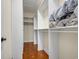 Walk-in closet with hardwood flooring and multiple shelves for optimal storage at 4232 Pointer Ct., Myrtle Beach, SC 29579