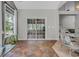Dining area with tile floors, a sliding glass door, and views of the backyard at 4232 Pointer Ct., Myrtle Beach, SC 29579
