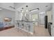 Modern kitchen with a breakfast bar, pendant lighting, and stainless steel appliances at 4232 Pointer Ct., Myrtle Beach, SC 29579