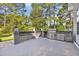 Covered outdoor kitchen featuring a stainless steel grill and sink at 4232 Pointer Ct., Myrtle Beach, SC 29579