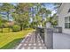 Outdoor kitchen with a bar area and stools, perfect for entertaining at 4232 Pointer Ct., Myrtle Beach, SC 29579