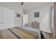 Comfortable bedroom featuring modern decor and an adjoining door to a hallway at 446 Rycola Circle, Surfside Beach, SC 29575