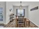 Dining room features a modern light fixture and seating for four at 446 Rycola Circle, Surfside Beach, SC 29575