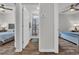 Hallway offers views of two bedrooms and a full bathroom, adding to the home's appeal at 446 Rycola Circle, Surfside Beach, SC 29575