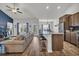 Bright kitchen with a large island that opens to the living room at 446 Rycola Circle, Surfside Beach, SC 29575