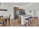 Eat-in kitchen with a large island, stainless steel appliances, and adjacent dining area at 446 Rycola Circle, Surfside Beach, SC 29575
