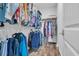 Walk-in closet with multiple hanging rods and shelves for optimal organization at 446 Rycola Circle, Surfside Beach, SC 29575