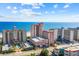 Stunning aerial view of the hotel resort with ocean view, multiple pools, and lush landscaping, perfect for a relaxing vacation at 5308 N Ocean Blvd. # 1202, Myrtle Beach, SC 29577