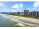 Stunning beachfront view of towering condos along a beautiful, sandy shoreline at 5308 N Ocean Blvd. # 1202, Myrtle Beach, SC 29577