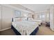Bright bedroom featuring two beds with seashell-themed bedding and coastal decor accents at 5308 N Ocean Blvd. # 1202, Myrtle Beach, SC 29577