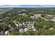 An aerial view of a quaint neighborhood surrounded by lush greenery and offering stunning views of the marsh at 58 Fathom Ln., Murrells Inlet, SC 29576