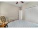 Bright bedroom with a comfortable chair and nautical themed bedding, and white closet doors at 58 Fathom Ln., Murrells Inlet, SC 29576