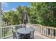 Outdoor deck featuring a dining table with seating, providing a perfect space for outdoor entertainment at 58 Fathom Ln., Murrells Inlet, SC 29576