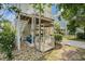 Exterior shot featuring a covered outdoor living space with a lift and parking area at 58 Fathom Ln., Murrells Inlet, SC 29576