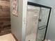 Modern shower with wood accent wall at 58 Fathom Ln., Murrells Inlet, SC 29576