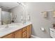 Bathroom with double vanity, a mirror, and updated fixtures at 592 Riverward Dr. # 592, Myrtle Beach, SC 29588