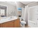 A full bathroom with light wood vanity, large mirror and shower tub combination at 592 Riverward Dr. # 592, Myrtle Beach, SC 29588