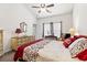 Spacious main bedroom featuring a ceiling fan, a large bed, and a dresser at 592 Riverward Dr. # 592, Myrtle Beach, SC 29588
