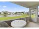 Covered patio with view of pond and fountain at 592 Riverward Dr. # 592, Myrtle Beach, SC 29588