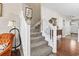 Carpeted staircase with white railings leading to the second floor at 592 Riverward Dr. # 592, Myrtle Beach, SC 29588