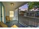 Inviting porch area with comfortable seating, string lights, and a view of the charming neighborhood at 6001-1623 S Kings Hwy., Myrtle Beach, SC 29575