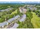 An aerial view highlighting the community's golf course, lush landscaping, and well-maintained condo buildings at 6015 Catalina Dr. # 733, North Myrtle Beach, SC 29582