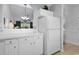 Kitchen with appliances, white cabinets, and view of the living room at 6015 Catalina Dr. # 733, North Myrtle Beach, SC 29582