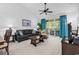 Living room with comfortable seating, balcony access, and plenty of natural light at 6015 Catalina Dr. # 733, North Myrtle Beach, SC 29582
