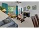 Cozy living room with a ceiling fan and a sliding glass door leading to outdoor space at 6015 Catalina Dr. # 733, North Myrtle Beach, SC 29582