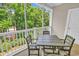 Relaxing screened-in porch with seating, perfect for enjoying the outdoors with a lovely view at 6015 Catalina Dr. # 733, North Myrtle Beach, SC 29582