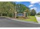 Inviting brick entrance to Arbor Trace community with manicured landscaping and neighborhood signage at 6015 Catalina Dr. # 733, North Myrtle Beach, SC 29582