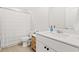 Bathroom featuring a white vanity, tiled floors, and a shower with curtain at 625 Heritage Downs Dr., Conway, SC 29526