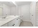 Bright bathroom featuring double sink vanity, white cabinets, and tiled floors at 625 Heritage Downs Dr., Conway, SC 29526