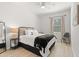 Bright bedroom features a queen bed, side table, and a window with natural light at 625 Heritage Downs Dr., Conway, SC 29526