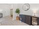 Welcoming entryway featuring modern furnishings and decor, plus a stylish round mirror at 625 Heritage Downs Dr., Conway, SC 29526