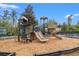 Community playground featuring multiple slides and climbing structures for active outdoor fun at 625 Heritage Downs Dr., Conway, SC 29526