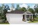 Charming single-story home featuring a two-car garage, well-manicured lawn, and blooming flower beds at 6351 Swainson Street Sw, Ocean Isle Beach, NC 28469