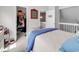 Bedroom featuring closet, access to the upstairs hall, and comfortable sleeping space at 701 Wilshire Ln. # 0, Murrells Inlet, SC 29576