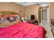 Bedroom featuring a bed, desk, Ohio State décor and view of the home at 701 Wilshire Ln. # 0, Murrells Inlet, SC 29576
