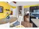 Eat-in kitchen features adjacent access to living spaces and includes black appliances at 701 Wilshire Ln. # 0, Murrells Inlet, SC 29576