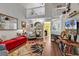 Bright living room featuring tall ceilings, hardwood floors, and stylish décor at 701 Wilshire Ln. # 0, Murrells Inlet, SC 29576